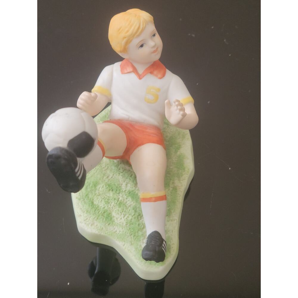 Vintage Enesco Figurine Boy Kicking a Soccer Ball #5 on his Shirt Dated 1984